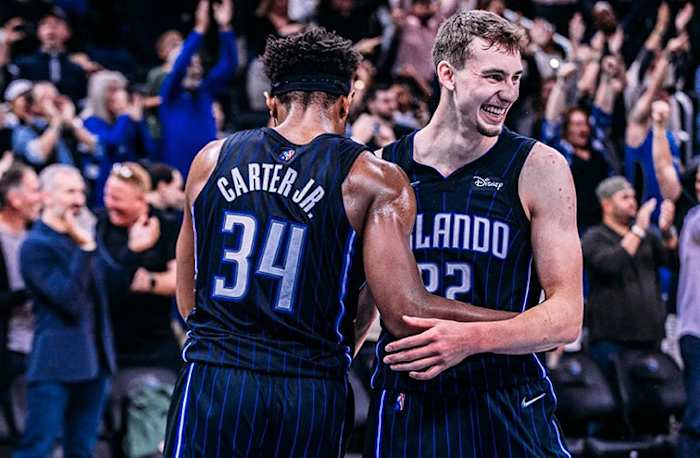 Orlando Magic teammates Franz Wagner and Wendell Carter Jr. celebrate.